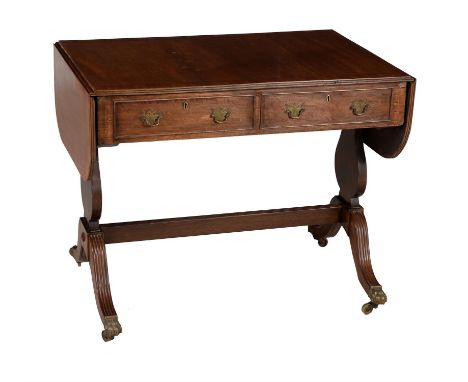 
	
		A mahogany sofa table in Regency style, 19th century, with two frieze drawers, 74cm high, 143cm wide (when open), 59.5cm