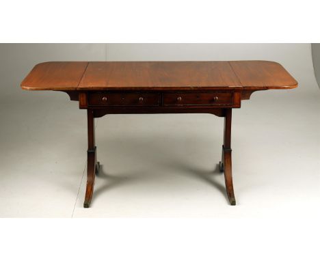 
	
		An early 19th century mahogany sofa table, of conventional twin drop leaf form, with ebonised stringing throughout, twin