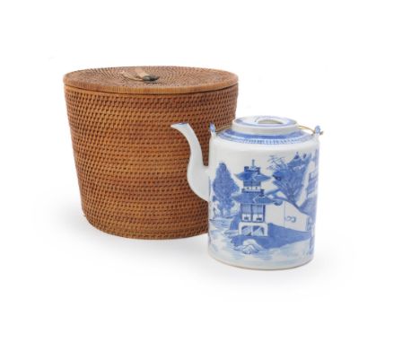 
	
		A Chinese blue and white teapot and cover, late Qing Dynasty, painted with pagodas in landscapes, 17cm high, in original