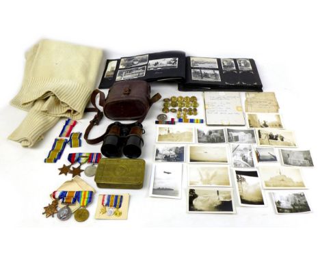 A collection of WWI and later militaria including a photograph album with over one hundred 1930s scenes of the HMS Berwick's 