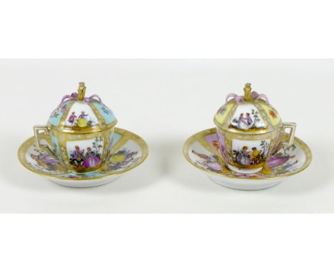 A pair of Dresden porcelain demi-tasse cups, covers, and saucers, late 19th century, one with pink and white quartered ground