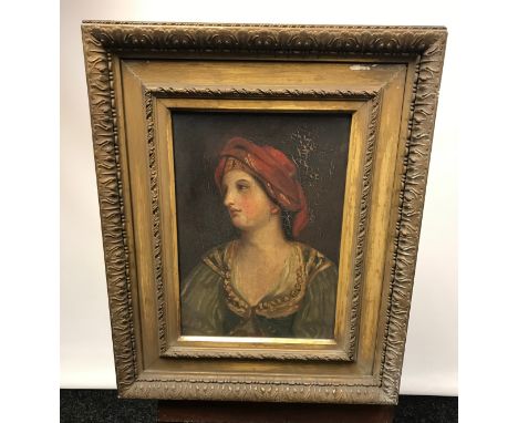 An 18th/ 19th century oil painting on canvas depicting a  portrait an European lady. Fitted within an ornate moulded and gilt