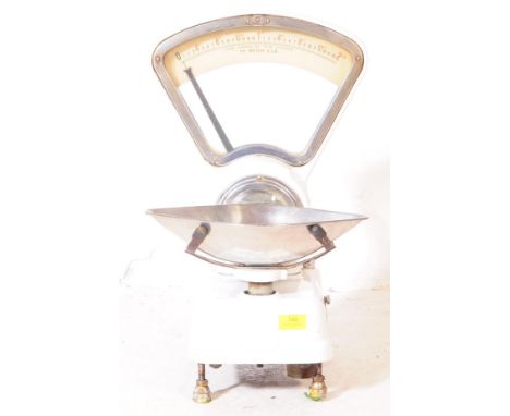 A vintage 20th century Avery greengrocers / shop factory scales, . Having a glazed measuring unit display. With a white metal