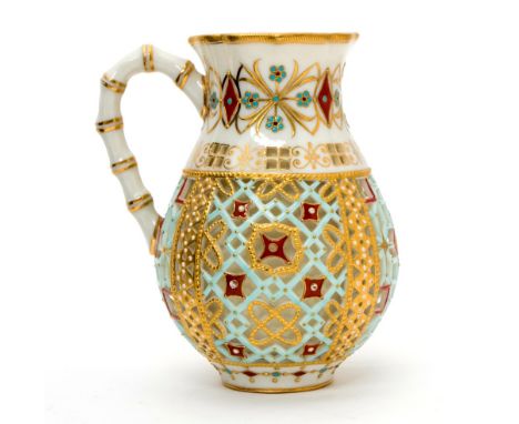 Attributed to George Owen for Royal Worcester, a blind reticulated jug, Aesthetic Movement, jewelled and gilded with bamboo h