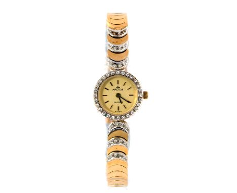 Arctos, a 14ct gold ladies Arctos Quartz wristwatch, 1.5cm circular dial with diamond set bezel, baton numerals, integral 14c