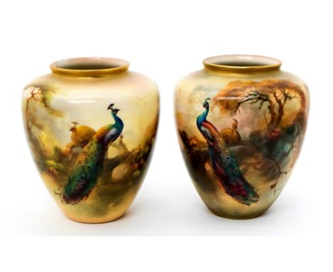 A pair of Royal Worcester vases, shouldered form, painted in the round by Sedgley, with peacocks in wooded landscapes, signed