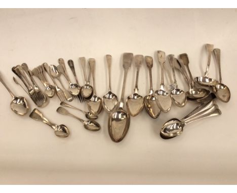 A quantity of George III and later silver flatware, fiddle pattern and Old English, various makers and dates, including sets 