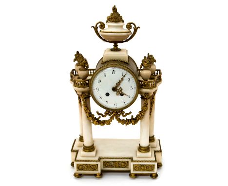 A 19th Century French white marble bracket clock, circa 1870, of Baroque design, ormolu mounts throughout, urn finial, 11cm w