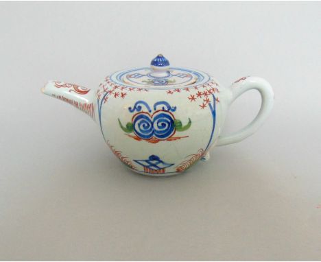 A rare small Vauxhall London delft teapot and cover, decorated in polychome colours, circa 1720, height 10cm, diameter from s