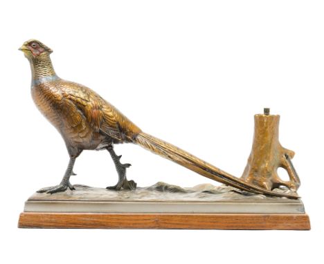 A cold painted spelter novelty table lighter of sporting interest, mid 20th Century, modelled as a standing cock pheasant, a 