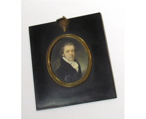 A 19th Century portrait miniature on ivory of handsome gentleman wearing a lace ruff and black coat, 7cm long 