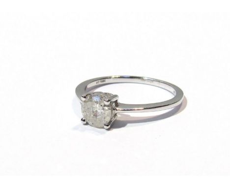 A solitaire diamond ring approx .60ct, 10k white gold shank, with Certificate of Authenticity 