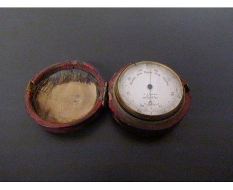 A. Franks travel barometer in case, Manchester, 4.5cm diameter 