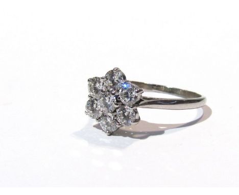 A white gold diamond daisy ring