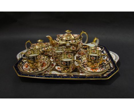 A late 19th Century Royal Crown Derby tea set circa 1893-95 in Imari pattern 2451, consisting of tray, teapot, sucrier, milk 