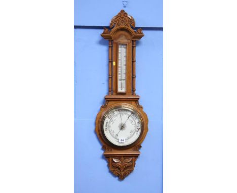 An Oak 2 glass barometer and 2 crooks