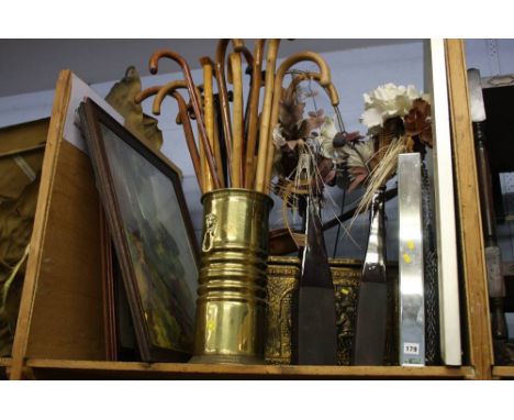 Shelf of assorted pictures, large clock etc.