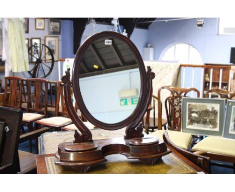 A Victorian mahogany dressing table mirror