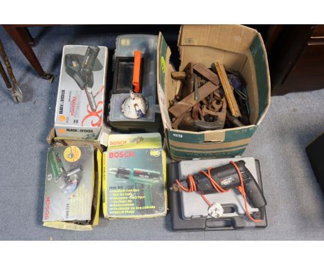A collection of assorted power tools &amp; hand tools.
