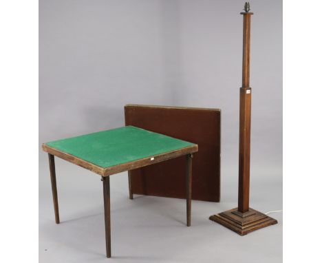 A mid-20th century beech standard lamp with a square centre column &amp; on a stepped square base; together with three card t