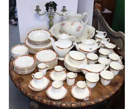 A Royal Doulton bone china “Sandon” seventy-two piece extensive part dinner, tea, &amp; coffee service; a floral decorated to