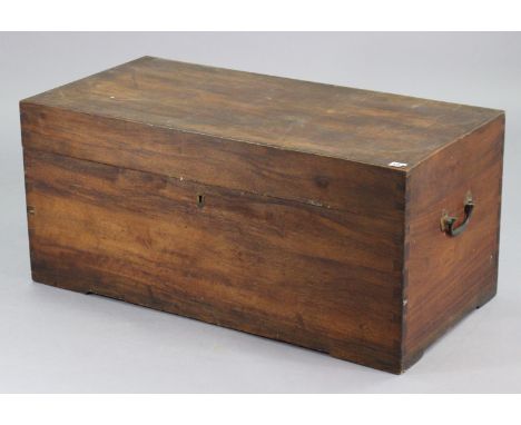 An early 20th century camphor wood trunk enclosed by a hinged lift-lid, &amp; with brass side handles, 38” wide x 17¼” high x