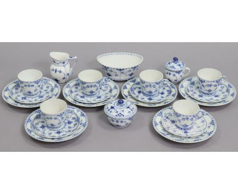 A Royal Copenhagen blue fluted full-lace twenty-piece tea service (pattern no.1035, settings for six); a similar jug (pattern