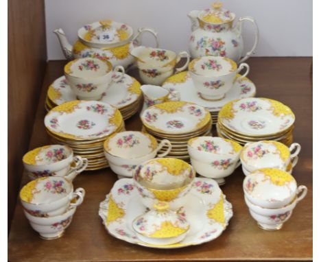 A Royal Paragon floral decorated extensive sixty-two piece part tea &amp; coffee service, part w.a.f.