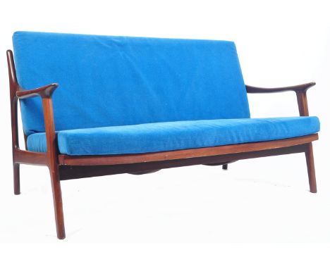 A quality retro vintage mid 20th Century 1960's Danish two seater sofa settee. The lounge sofa having teak show wood frame wi