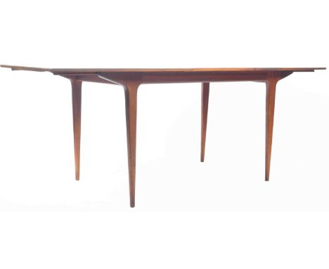AH Mcintosh &amp; Co of Kirkaldy - A retro vintage 20th Century teak wood extending dining table having a pull out two piece 