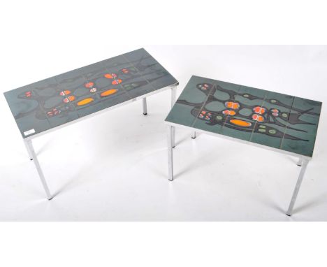 A retro vintage 1970's chrome and tile top coffee nest of tables in the manner of Adri. Each table set with ceramic painted t
