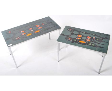 A retro vintage 1970's chrome and tile top coffee nest of tables in the manner of Adri. Each table set with ceramic painted t