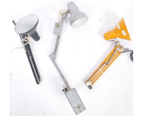 A collection of three retro vintage 20th Century industrial factory work lamps comprising an anglepoise type example in musta