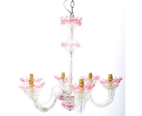 A mid 20th Century Italian Venetian Murano pink glass chandelier ceiling light having a central column with multiple scrolled
