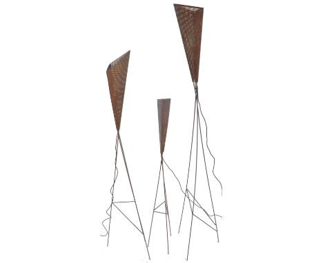 A set of three retro vintage 20th Century French perforated metal uplighters / floor standing lamps / lights in the manner of