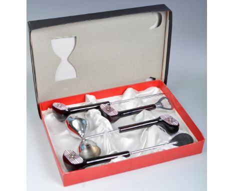 A set of retro vintage 1960's novelty cocktail bar drinks set of tools in the form of golf clubs comprising of four pieces wi