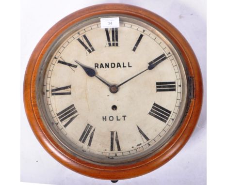 A vintage early to mid 20th Century English oak cased&nbsp;industrial factory / station type circular wall clock having facet