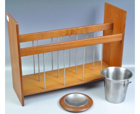 A collection of retro vintage 1960's teak wood items comprising a magazine rack with chrome bars dividers, Guy Degrenne stain