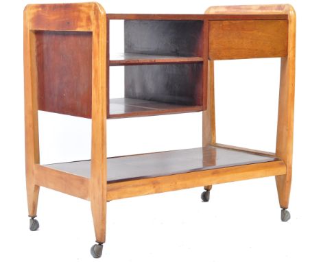 A retro vintage 20th Century stained oak two tier serving / tea / cocktail trolley having a single drawer to the right flanke