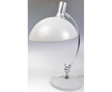 A retro vintage chrome and metal table lamp / desk lamp with sweeping chrome arm and grey enamel UFO / saucer shade. Standing