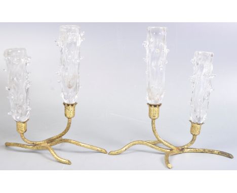 A pair of vintage French gilt metal and glass candlestick holders. The glass candlestick holders with glass prunts decoration