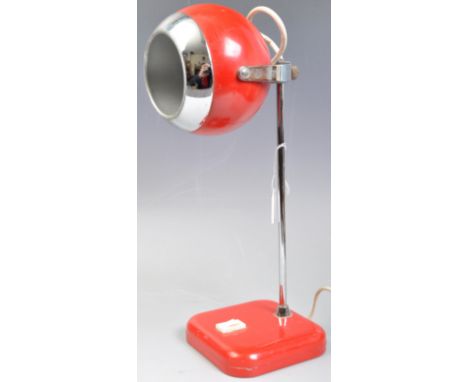 An original retro vintage 1960s Eyeball adjustable rise and fall desk lamp. Red, with chrome steel adjustable supports, mount