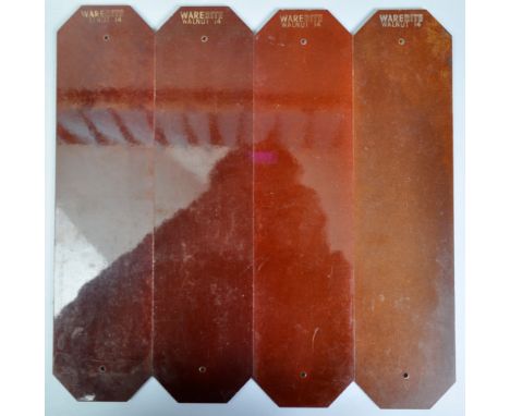 A set of four retro vintage 1950's Art Deco bakelite door handle plates of elongated rectangular form. Stamped to back Wareri