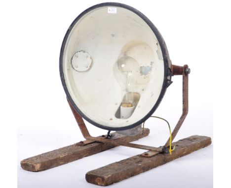 A vintage early 20th Century&nbsp;WWII Second World War landing light strip swivel light set with a single large bulb set wit