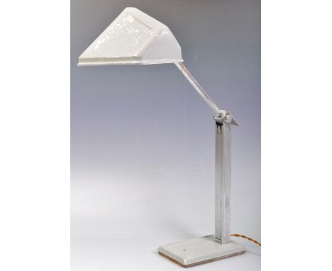 An original retro vintage 1960s believed French made Pirouette desk / work lamp / light. Squared base, with a chrome plated s