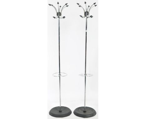 A pair of contemporary late 20th space age sputnik atomic style coat / hat stands of chrome tubular construction having a mul