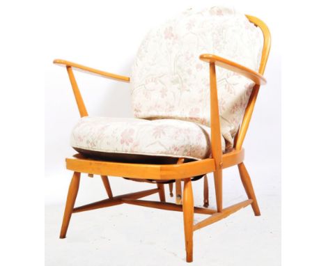 Lucian Ercolani - Ercol - Model 203 - A retro vintage 20th century beech and elm easy / lounge chair / armchair having large 