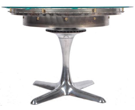 A 20th century custom build / designed coffee / side table made from a Tornado jet fighter turbine starter jet engine. The po