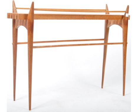A retro vintage 1960's teak wood plant stand having a slatted plank top raised on turned spindle legs and supports united by 