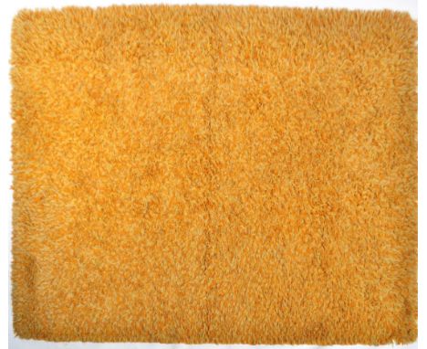 Heals of London - An original retro vintage 20th Century wool shag pile flor carpet rug having a caramel brown ground. The re